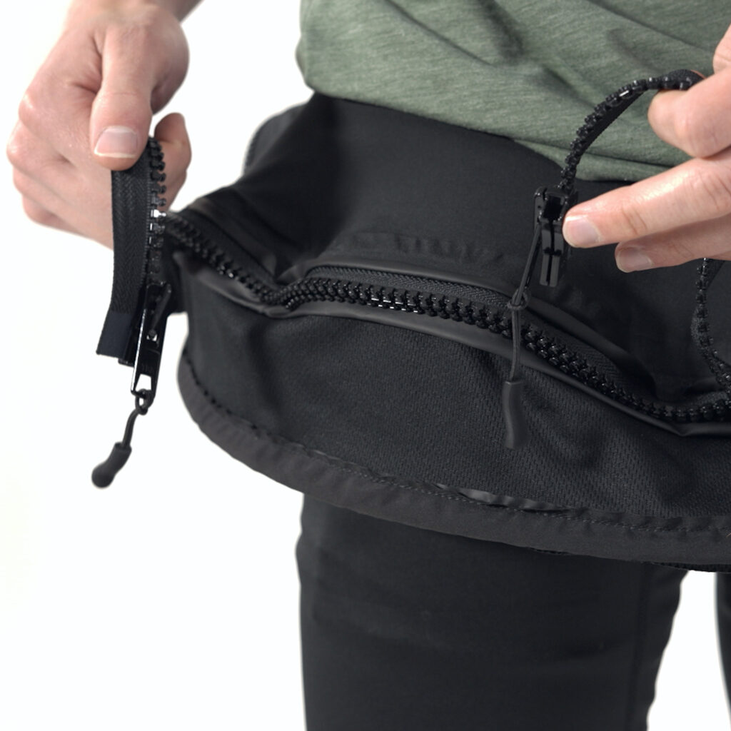Model wearing Boost Treadmill Shorts with double zipper